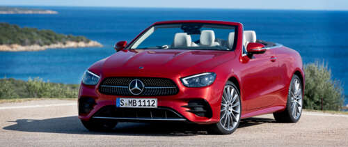 A luxury Mercedes-Benz E 450 Cabriolet convertible car in a professional setting. UWUHD wallpaper photo gallery download