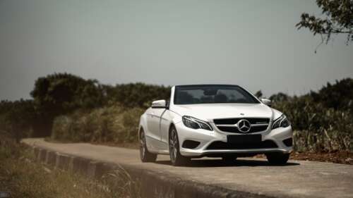 A luxurious white Mercedes-Benz E-Class convertible car. 4K (Ultra HD) high definition wallpaper