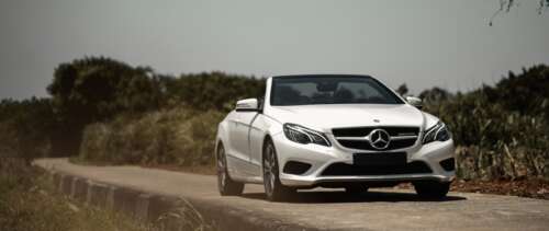 A luxurious white Mercedes-Benz E-Class convertible car. high definition wallpaper