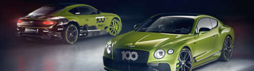 A luxurious green Bentley Continental GT grand tourer showcasing its sleek design. high definition wallpaper
