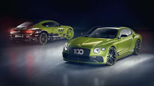 A luxurious green Bentley Continental GT grand tourer showcasing its sleek design. 8K wallpaper for laptop download