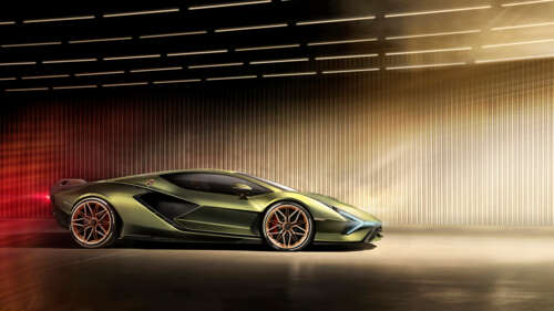 A high-performance emerald green Lamborghini Sián FKP 37 supercar parked prominently. 4K (Ultra HD) high definition wallpaper