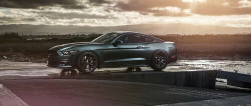 A high-performance Ford Mustang GT muscle car featuring classic automotive styling. UWUHD wallpaper for laptop download