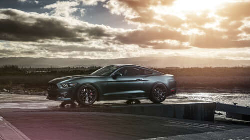 A high-performance Ford Mustang GT muscle car featuring classic automotive styling. 8K wallpaper