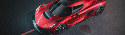 A stunning shot of a Koenigsegg Jesko supercar highlighting its sleek and aggressive... Dual UHD