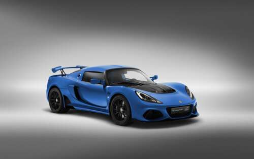 A high-performance Lotus Exige supercar featuring a sleek and aerodynamic body design. 7680x4800 desktop wallpaper