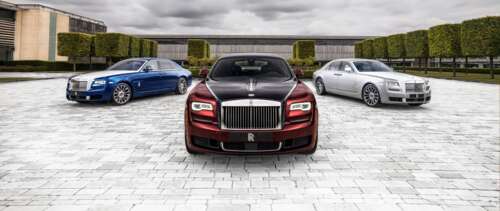 A high-end silver Rolls-Royce Ghost luxury sedan featuring a polished metallic finish. free wallpaper