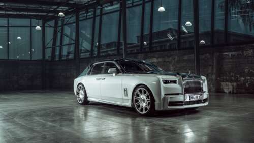 A stunning view of a Rolls-Royce Phantom luxury sedan, highlighting its iconic grille... 4K (Ultra HD)