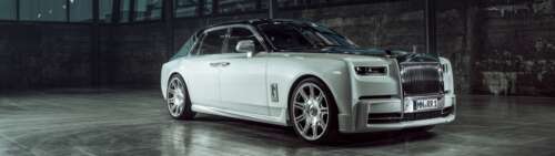 A stunning view of a Rolls-Royce Phantom luxury sedan, highlighting its iconic grille... Dual UHD desktop wallpaper