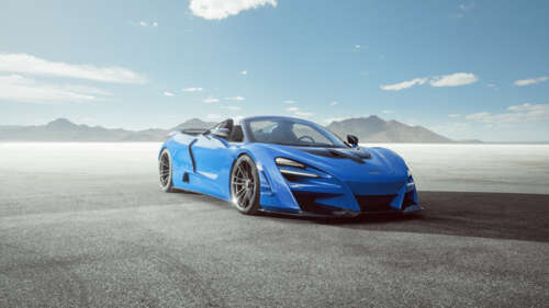 A high-performance McLaren 720S supercar showcasing its sleek, aerodynamic body and... 8K ps4 wallpaper