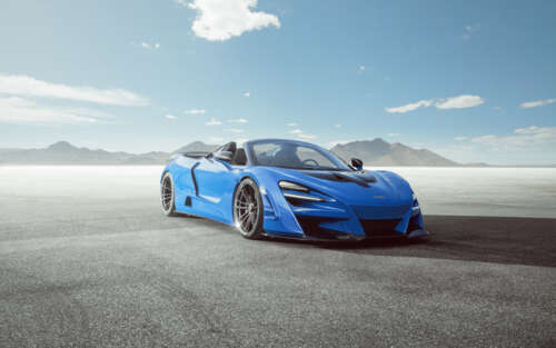 A high-performance McLaren 720S supercar showcasing its sleek, aerodynamic body and... 7680x4800 pictures for wallpaper