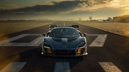 A sleek and powerful McLaren Senna supercar featuring aerodynamic bodywork and high-performance... 4K (Ultra HD) ps4 wallpaper