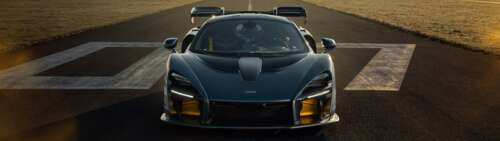 A sleek and powerful McLaren Senna supercar featuring aerodynamic bodywork and high-performance... Dual UHD pictures for wallpaper