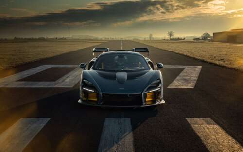 A sleek and powerful McLaren Senna supercar featuring aerodynamic bodywork and high-performance... 7680x4800 background images hd