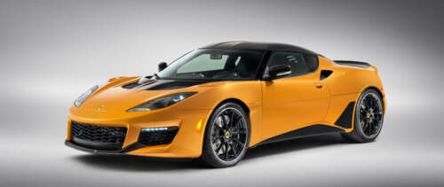 A vibrant orange Lotus Evora GT supercar featuring sleek aerodynamic curves. wallpaper