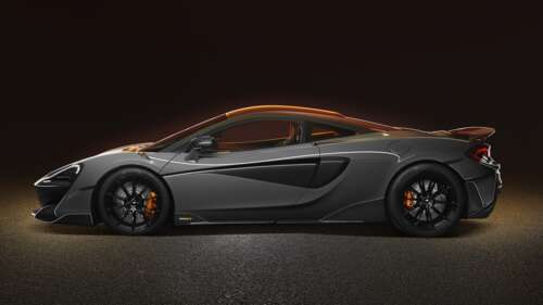 A high-resolution view of a silver McLaren 600LT supercar showcasing its aerodynamic... 8K wallpaper photo gallery download