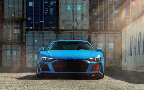 A close-up, high-detail shot of a premium Audi R8 supercar highlighting its sleek... 7680x4800 wallpaper photo gallery download