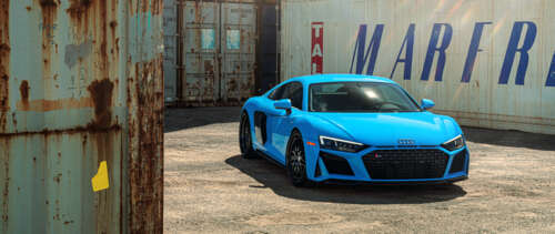 A high-performance Audi R8 supercar featuring an aerodynamic design and metallic... UWUHD computer backgrounds