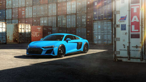 A close-up shot of a high-performance Audi R8 supercar featuring a streamlined design... 8K wallpaper images