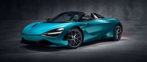 A detailed view of a high-performance McLaren 720S supercar, highlighting its aerodynamic... UWUHD wallpaper for pc download
