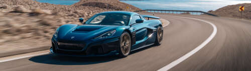 A high-performance Rimac Nevera electric supercar featuring a sleek, aerodynamic... Dual UHD wallpaper download