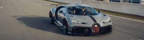 A high-performance silver Bugatti Chiron Pur Sport supercar featuring metallic finish... background images hd