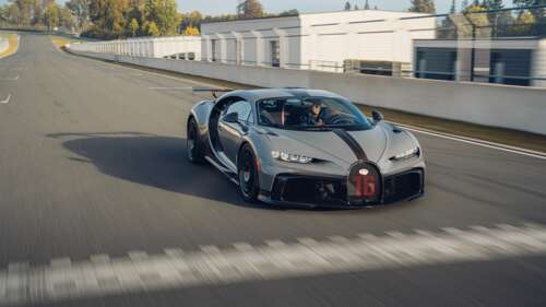 A high-performance silver Bugatti Chiron Pur Sport supercar featuring metallic finish... 8K background images hd