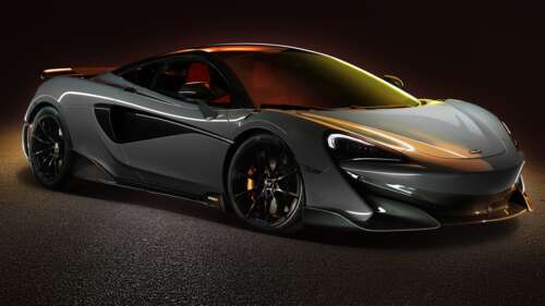 A high-performance McLaren 600LT supercar in a brilliant metallic silver finish,... 8K free background images