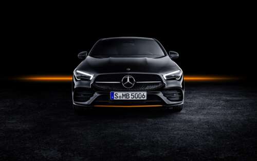 A high-detail shot of a silver Mercedes-Benz CLA-Class featuring a brilliant metallic... free wallpaper