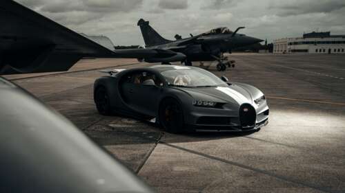 A black Bugatti Chiron supercar designed with the aerodynamic features and metallic... 4K (Ultra HD) hd background