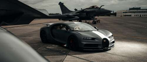 A black Bugatti Chiron supercar designed with the aerodynamic features and metallic... UWUHD pictures for wallpaper