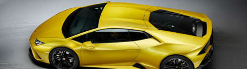 A vibrant yellow Lamborghini Huracan Evo supercar highlighting its sleek, aerodynamic... Dual UHD pictures for wallpaper