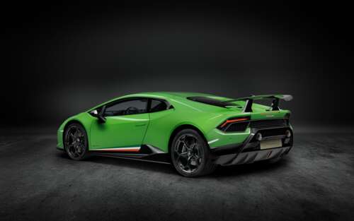 A close-up shot of a bright green Lamborghini Huracan Performante supercar. 7680x4800 computer backgrounds