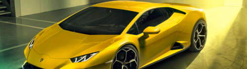 A bright yellow Lamborghini Huracan Evo supercar featuring sharp aerodynamic lines... Dual UHD wallpaper