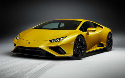 A high-performance yellow Lamborghini Huracan Evo supercar showcasing its sleek and... 7680x4800 free wallpaper