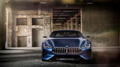 A sleek and futuristic BMW Concept 8 Series luxury car showcasing advanced aerodynamic... 4K (Ultra HD) wallpaper for laptop download
