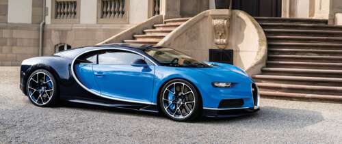 A high-performance Bugatti Chiron supercar featuring sleek aerodynamic lines and... UWUHD free hd wallpapers