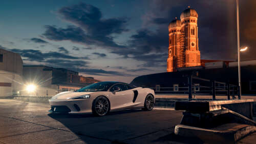 A sleek white McLaren GT supercar featuring modern aerodynamic design and luxury... 4K (Ultra HD) pictures for wallpaper