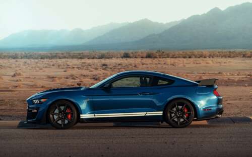 A powerful Ford Mustang Shelby GT500 muscle car with aggressive styling and high-performance...