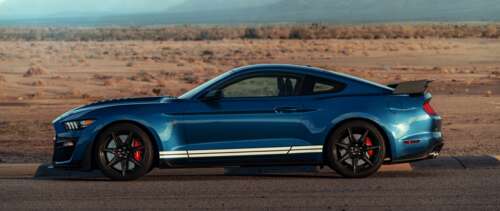 A powerful Ford Mustang Shelby GT500 muscle car with aggressive styling and high-performance... UWUHD free wallpaper for computer