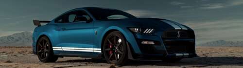 A high-performance Ford Mustang Shelby GT500 muscle car. Dual UHD free desktop wallpaper