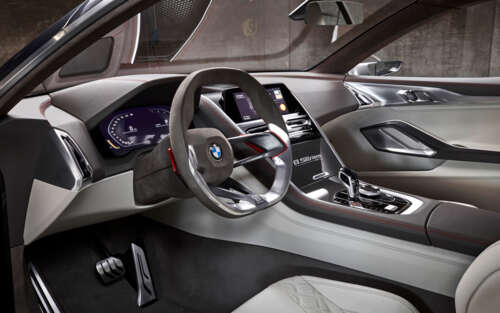 Detailed view of the high-tech dashboard and premium interior components of the BMW... 7680x4800 desktop wallpaper