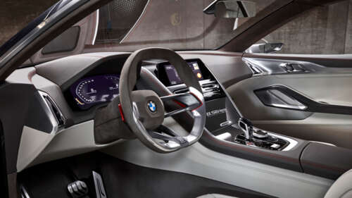 Detailed view of the high-tech dashboard and premium interior components of the BMW... 8K wallpaper for laptop download