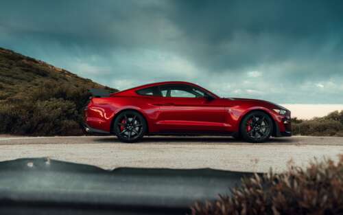 A detailed view of a Ford Mustang Shelby GT500 muscle car. 7680x4800 ps4 wallpaper