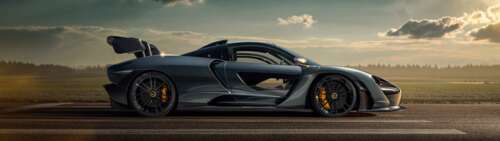 A detailed view of the McLaren Senna supercar showcasing its aerodynamic body and... Dual UHD wallpaper download