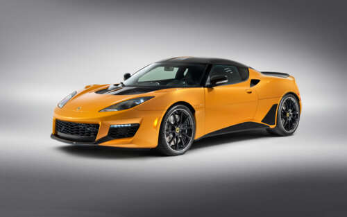A vibrant orange Lotus Evora GT supercar featuring sleek aerodynamic curves. 7680x4800 free desktop wallpaper