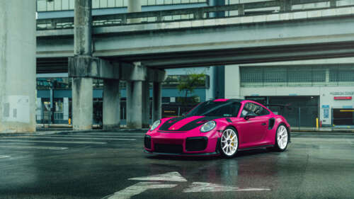 A bright pink Porsche 911 GT2 RS luxury sports car 4K (Ultra HD) free wallpaper for computer