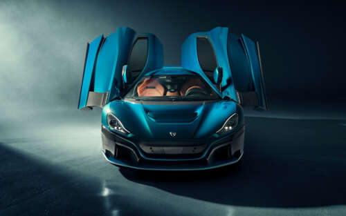 A sleek, high-performance Rimac Nevera electric hypercar displaying aerodynamic design.