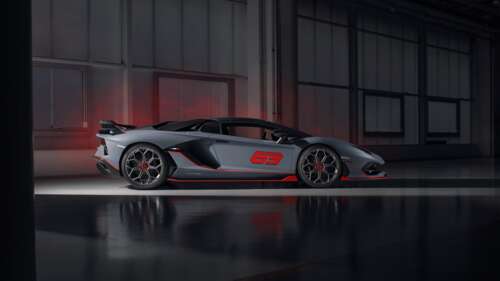 A sleek, metallic silver Lamborghini Aventador SVJ supercar showcasing its aerodynamic... 4K (Ultra HD) wallpaper download