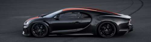 A close-up shot of a black Bugatti Chiron supercar with a glossy finish. Dual UHD wallpaper for laptop download